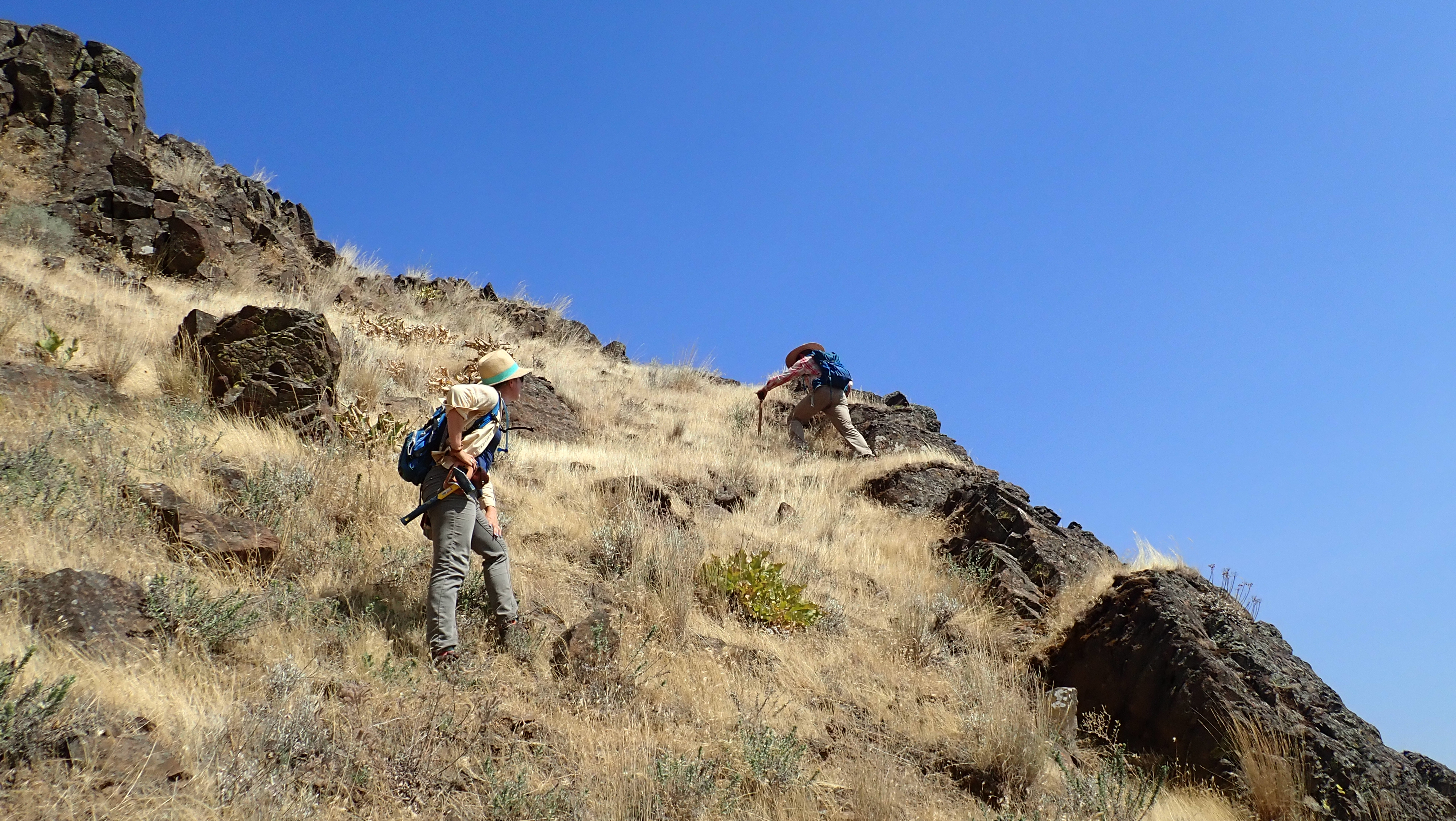 Andrew and climbing up a basalt outcrop